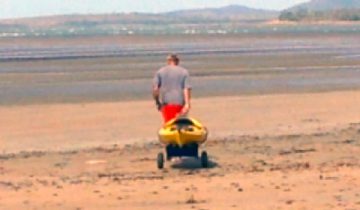 Pulling Kayak across mudflats